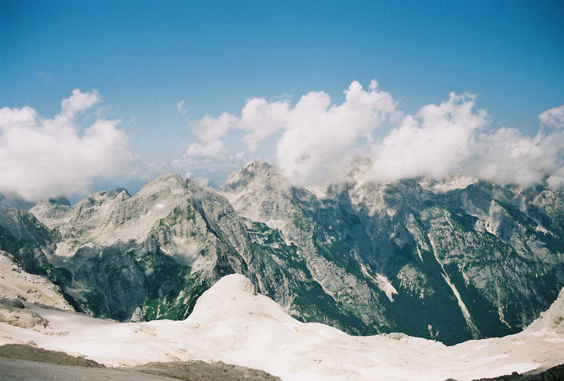 Snowy mountains with clouds